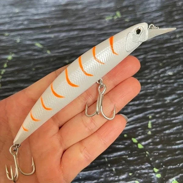 White with orange bars: a high-visibility minnow for stained water.